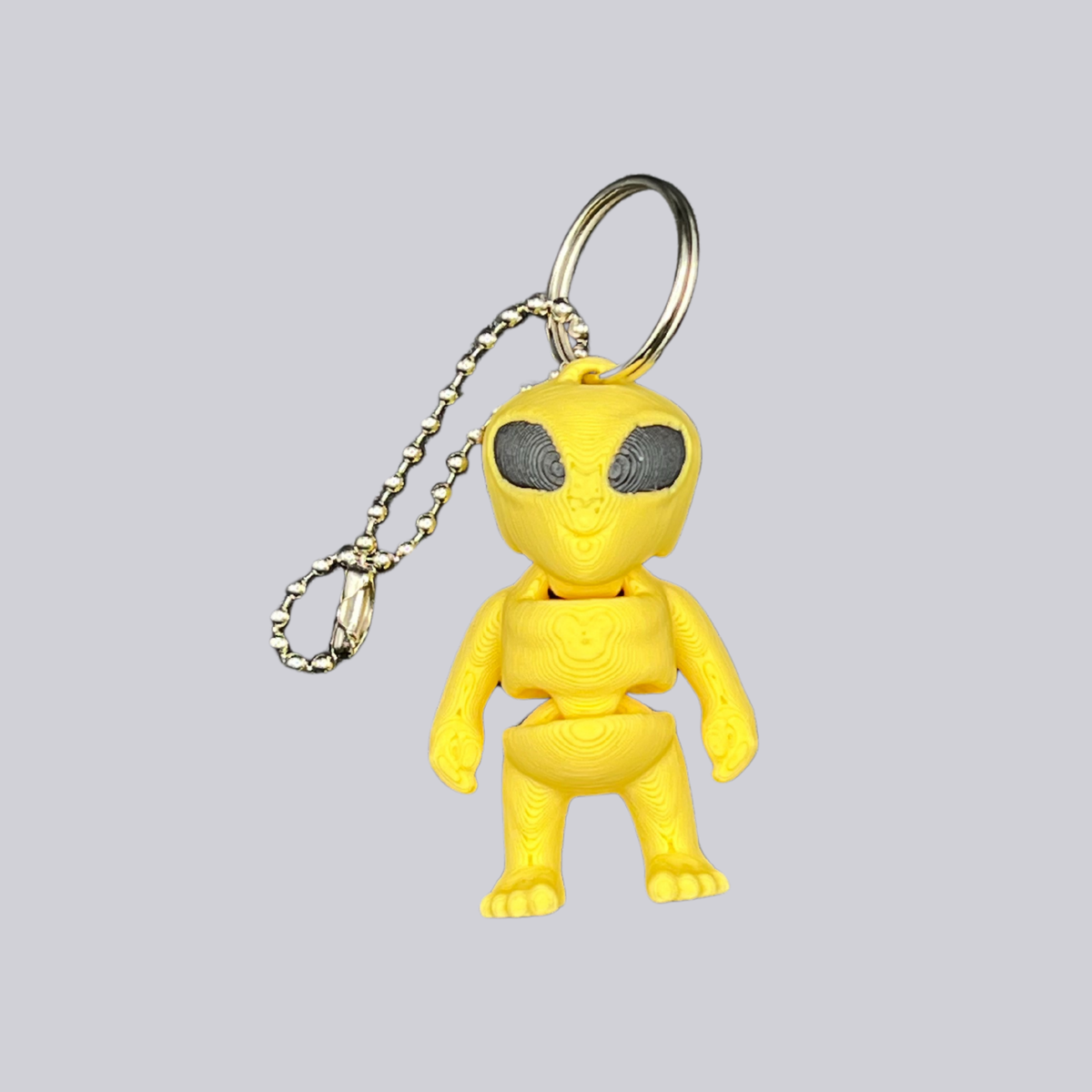 Alien  - Beweglicher Schlüsselanhänger Gelb oder Grün