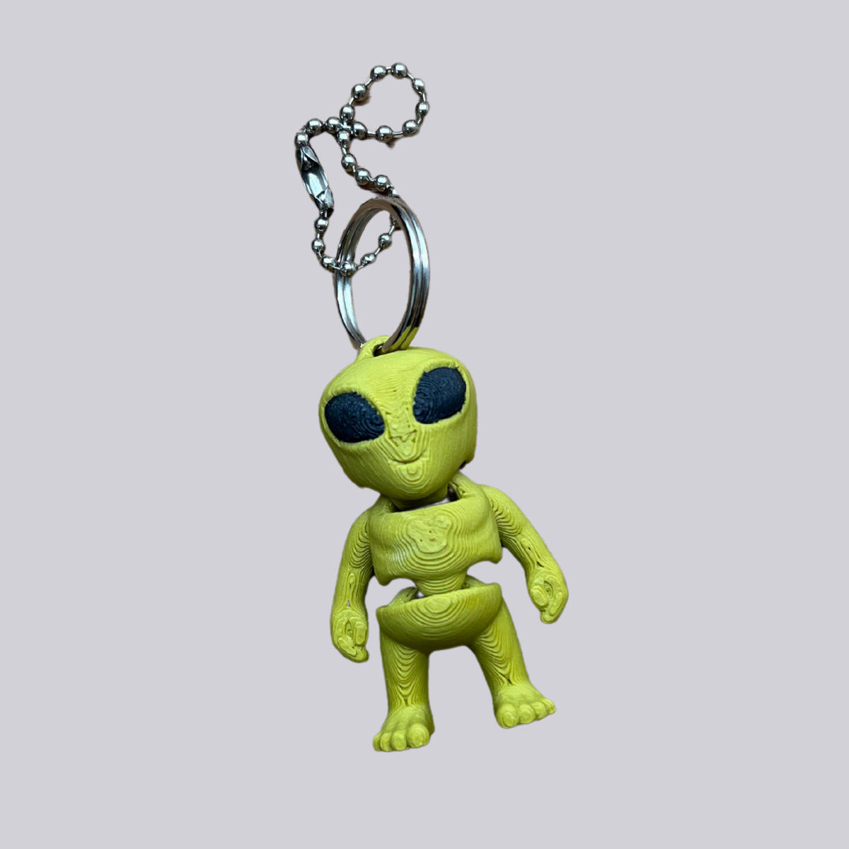Alien  - Beweglicher Schlüsselanhänger Gelb oder Grün