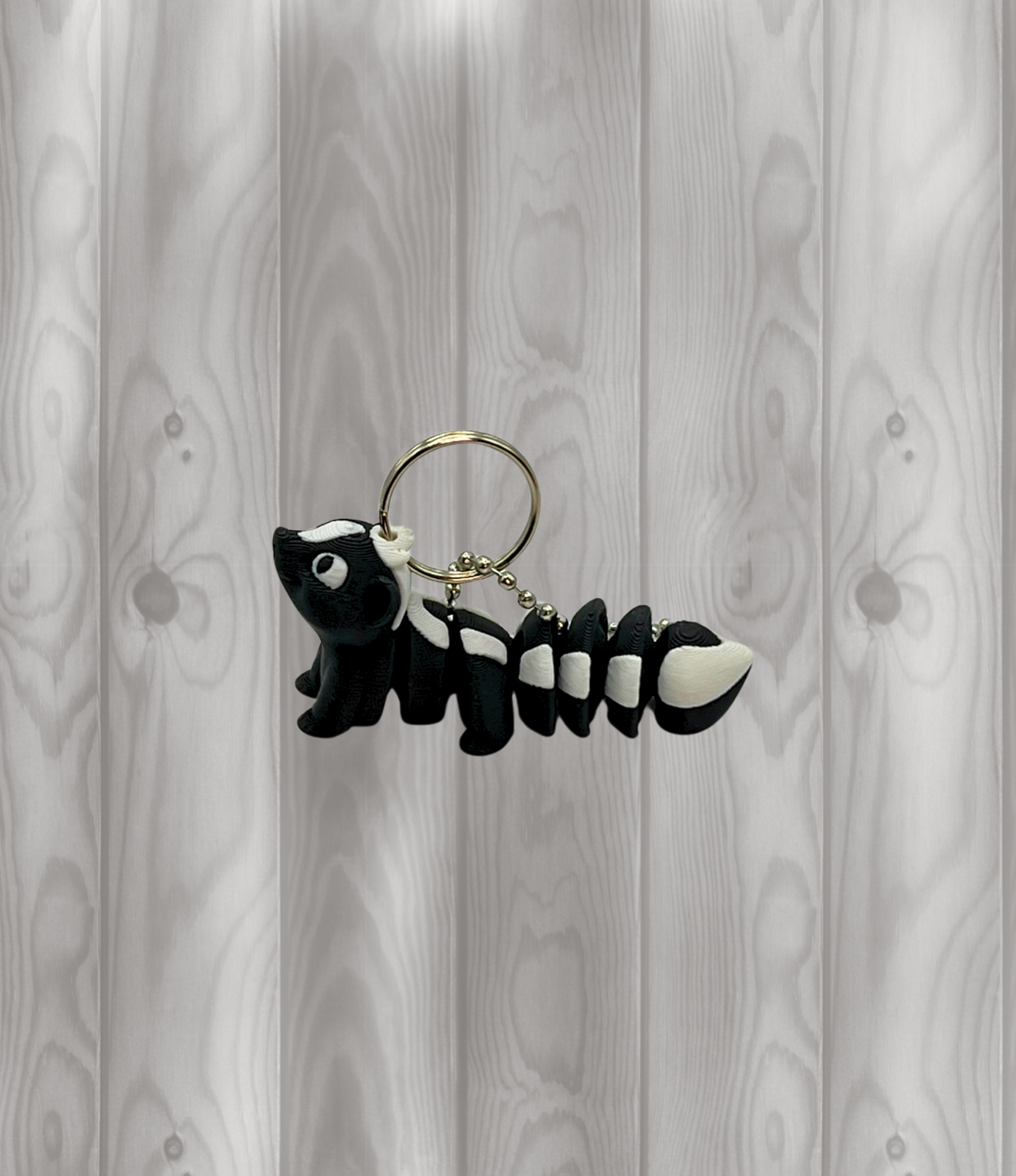 Stinktier - Beweglicher Schlüsselanhänger